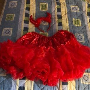 Devil horns and tutu